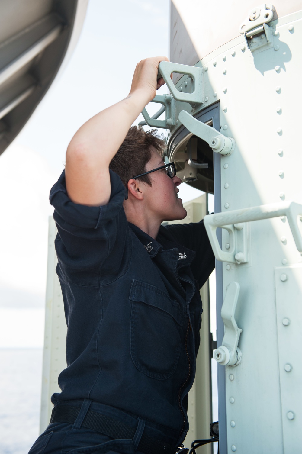 USS America Sailors conduct maintenance on CIWS