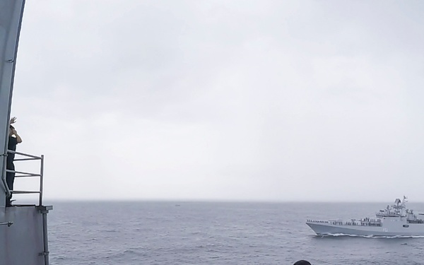 USS Pearl Harbor manuevers with the INS Trikand during live-fire gunnery exercise