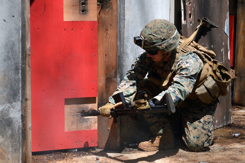 Combat Engineers, Marines breach doors with shotguns