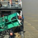Harry Claiborne  crew assesses Harvey's damage