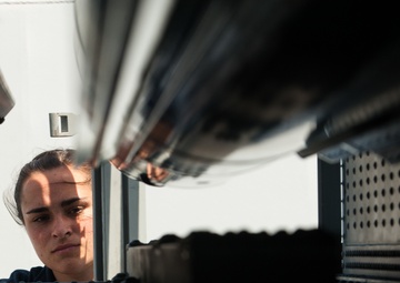 USS America Sailors conduct maintenance on NATO Sea Sparrow