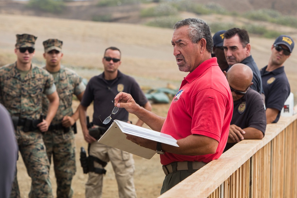 Absorbing the recoil: MPs fire the Beretta and M1014