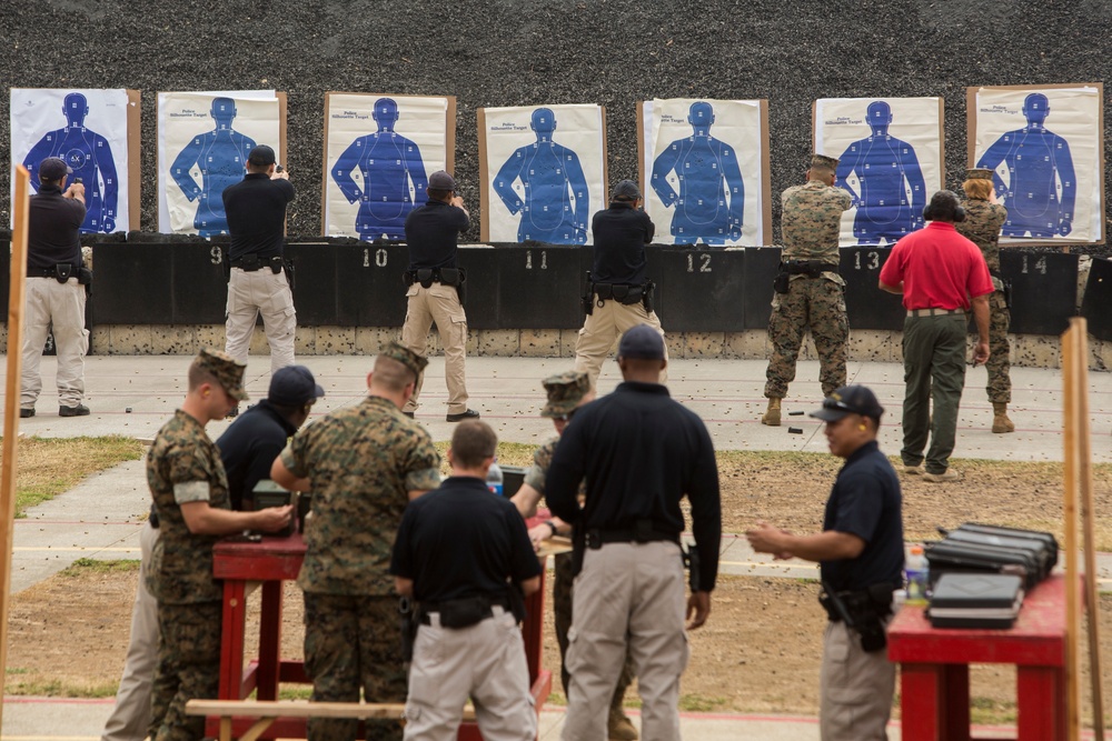 Absorbing the recoil: MPs fire the Beretta and M1014
