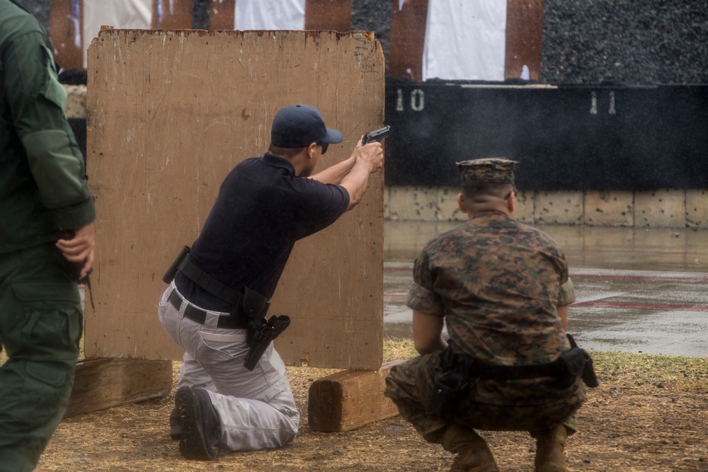 Absorbing the recoil: MPs fire the Beretta and M1014