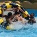 Nimitz Sailors Partake In Water Slide