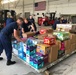 Coast Guard crews prepare supplies for Hurricane Harvey relief