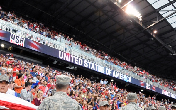 Service members hit the field with the United States men's national soccer team