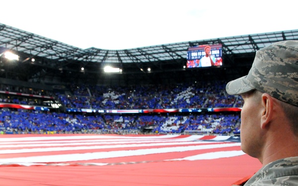 Service members hit the field with the United States men's national soccer team