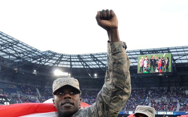 Service members hit the field with the United States men's national soccer team