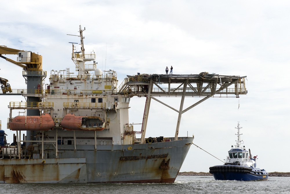 Coast Guard monitors the recovery and transit of grounded drill ship