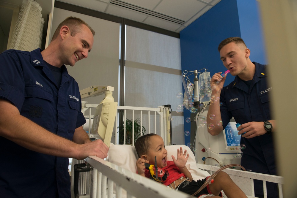 Coast Guard members reunite with rescued children