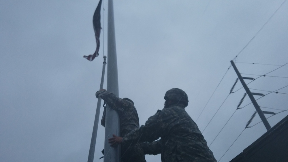 Soldiers attempt to retrieve flag