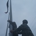 Soldiers attempt to retrieve flag