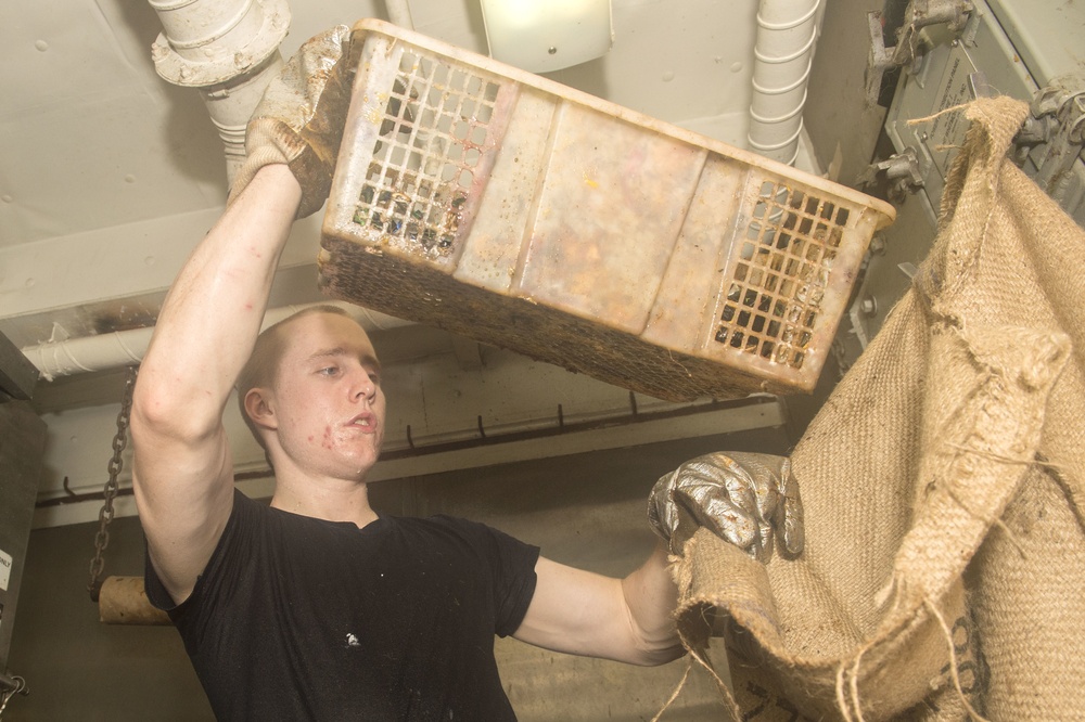 Nimitz Sailor Seperates Trash