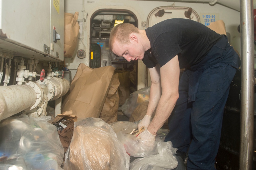 Nimitz Sailor Seperates Trash