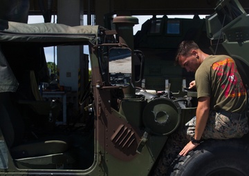 Marines work under the hood