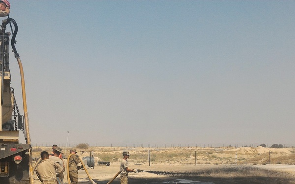 854th Engineers roll out new road surface