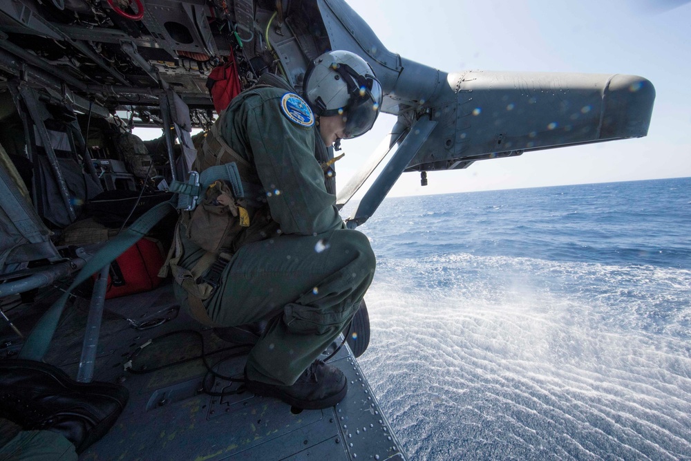 Navy helos practice ocean rescues