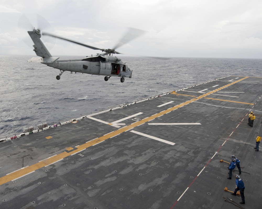 MH-60S Sea Hawk helicopter departs USS Wasp (LHD 1) en route to the U.S. Virgin Islands in the wake of Hurricane Irma