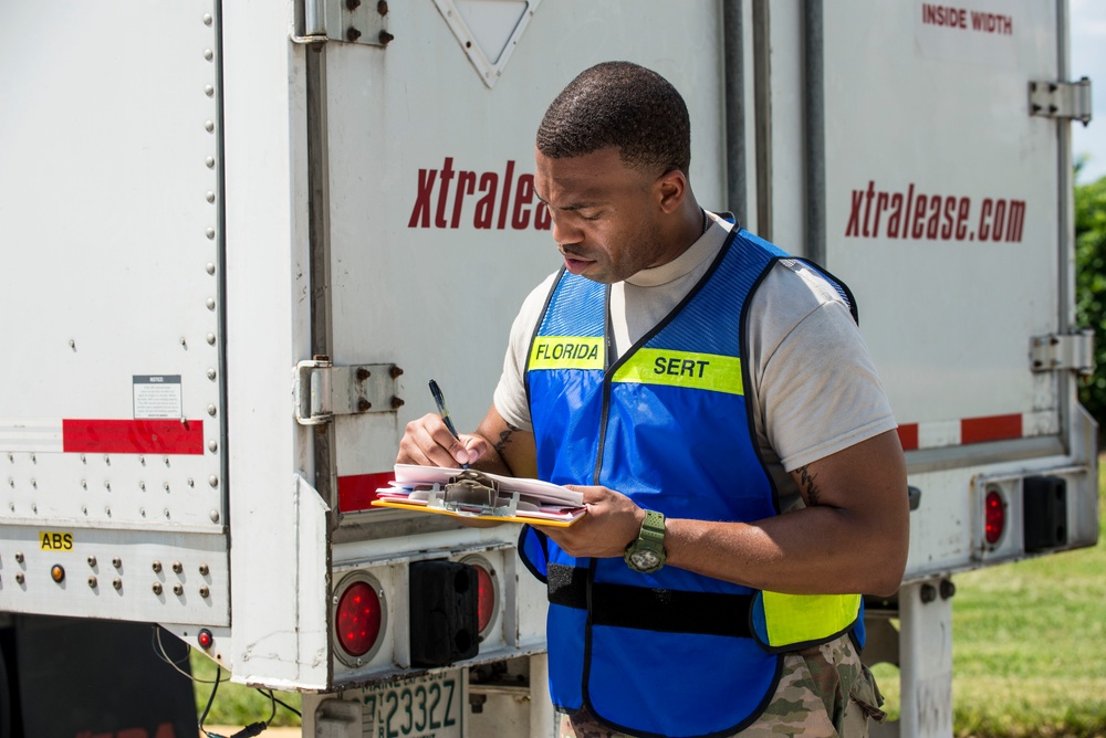 Florida National Guard stages supply vehicles in Orlando for Hurricane Irma