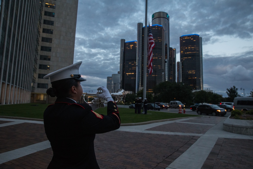U.S. Marines sound the colors and taps in the evening