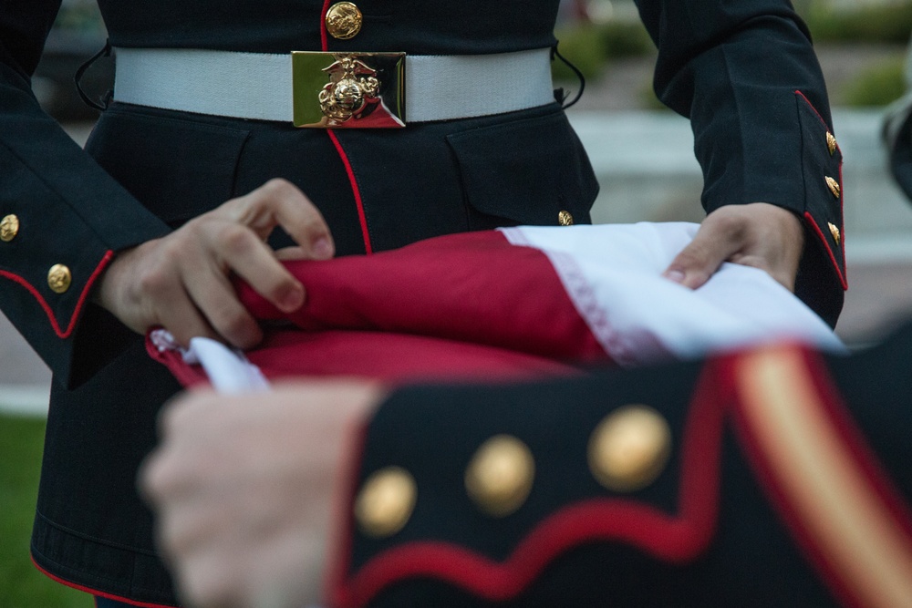 U.S. Marines sound the colors and taps in the evening