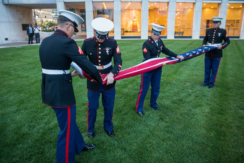 U.S. Marines sound the colors and taps in the evening