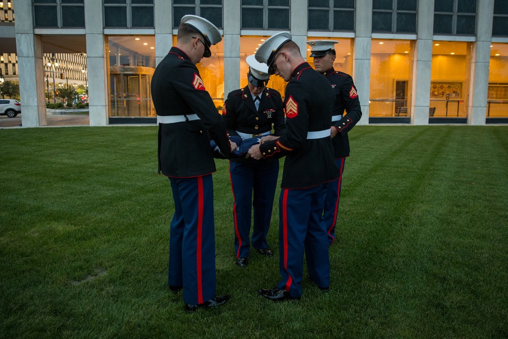 U.S. Marines sound the colors and taps in the evening