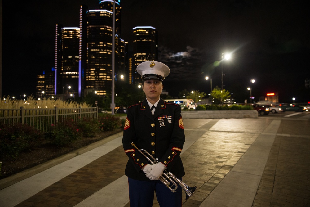 U.S. Marines sound the colors and taps in the evening