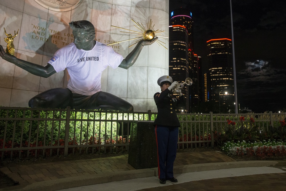 U.S. Marines sound the colors and taps in the evening