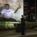 U.S. Marines sound the colors and taps in the evening