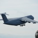 Spectators look on at final C-5A Galaxy Departure