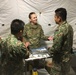 Maj. Beth McCluskey conducts nursing training