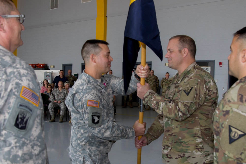 Outgoing Battalion Commander Passes Guidon to Brigade Commander