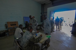 Joint effort moves personnel, cargo to storm victims