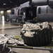 Air Force reservists camp out next to rescue heliocpters during Hurricane Irma