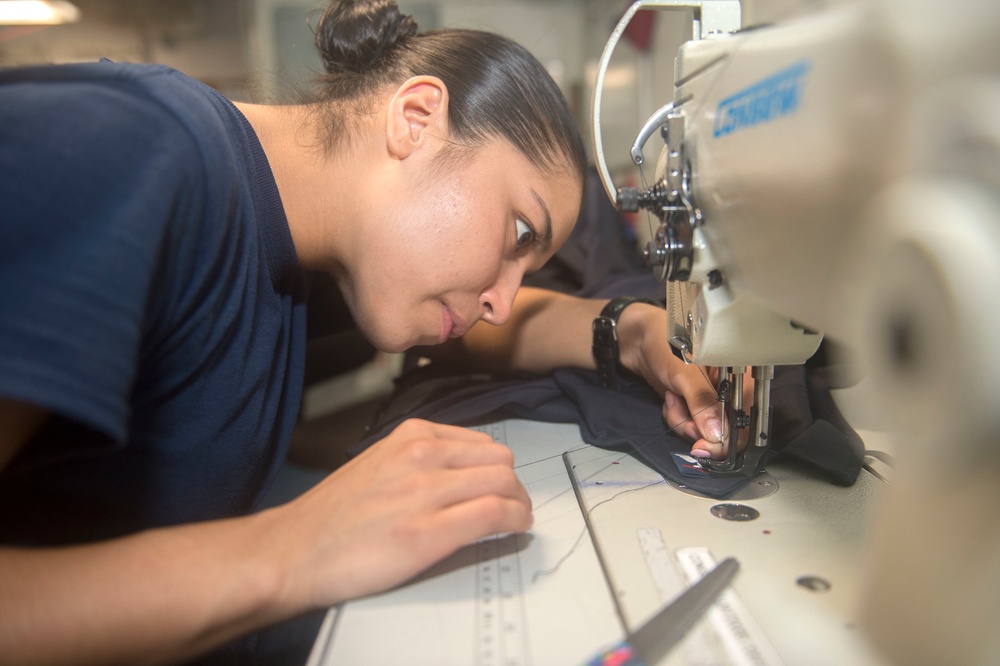 Nimitz Sailors Conduct Maintenance