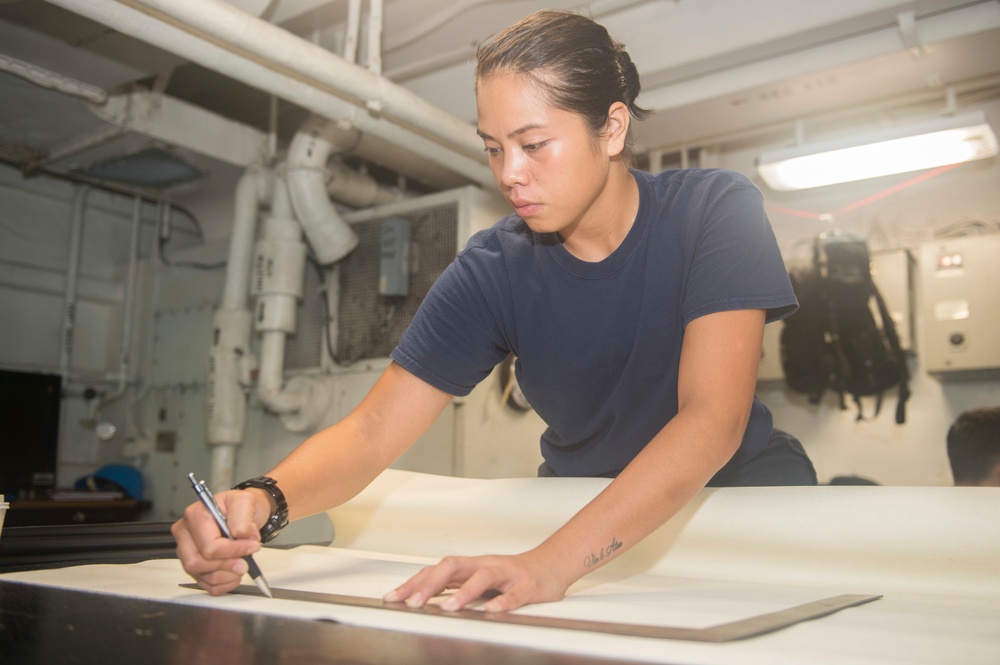 Nimitz Sailors Conduct Maintenance