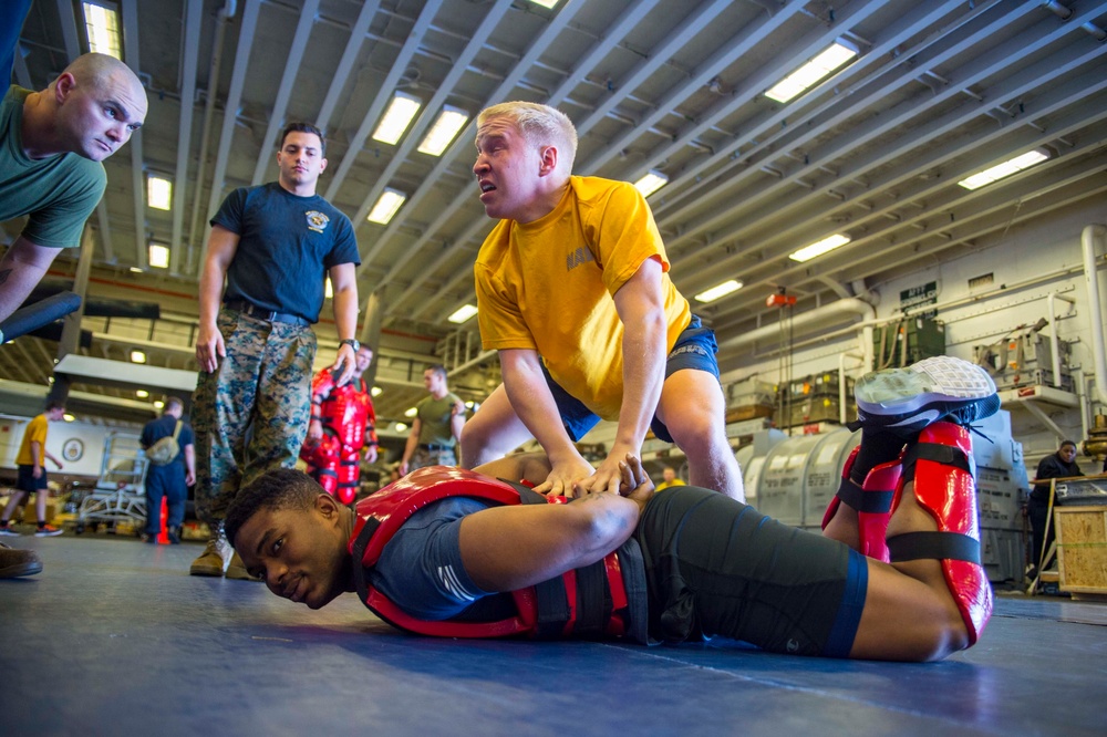 Sailors and Marines conduct OC Qualification Course aboard USS Bonhomme Richard (LHD 6)