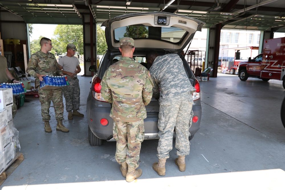Arkansas National Guard and Texas residents stand as one after Hurricane Harvey