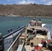 U.S. Navy Sailors prepare to land a landing craft utility (LCU), assigned to the dock landing ship USS Oak Hill (LSD 51)