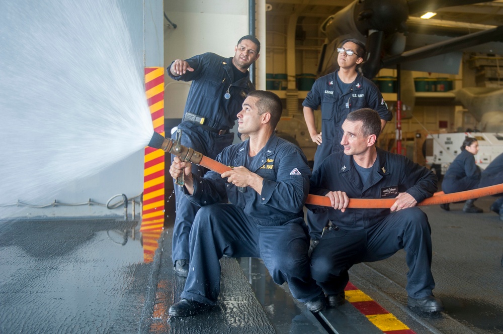 USS America Sailors rehearse damage control tactics