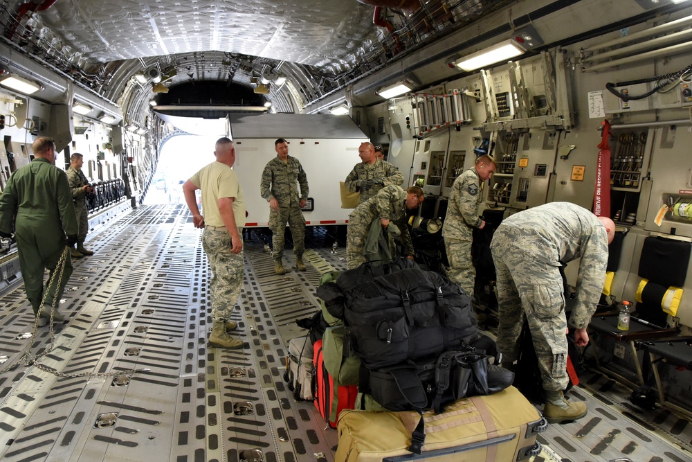 A six person team from the 269th Combat Communications Squadron, Ohio Air National Guard board a C-17 Globemaster III as they prepare to fly to St. Thomas, U.S. Virgin Island in support of Hurricane Irma relief efforts Sept. 7.