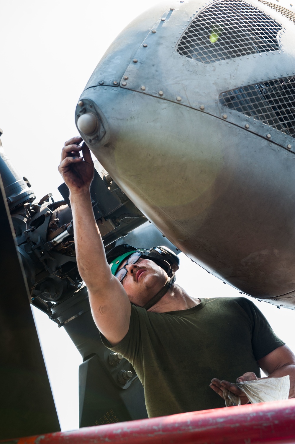 USS America Marine conducts aircraft maintenance