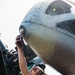 USS America Marine conducts aircraft maintenance