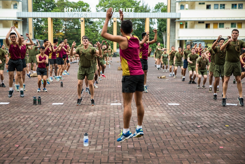 U.S. Marines and SAF Warm-Up for FINEX with PT