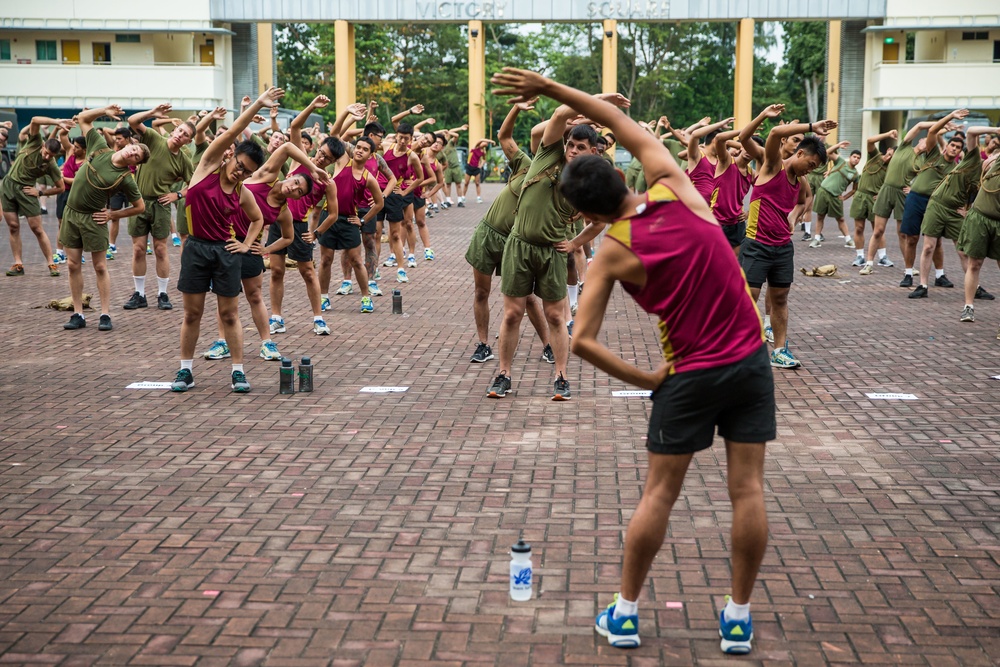 U.S. Marines and SAF Warm-Up for FINEX with PT