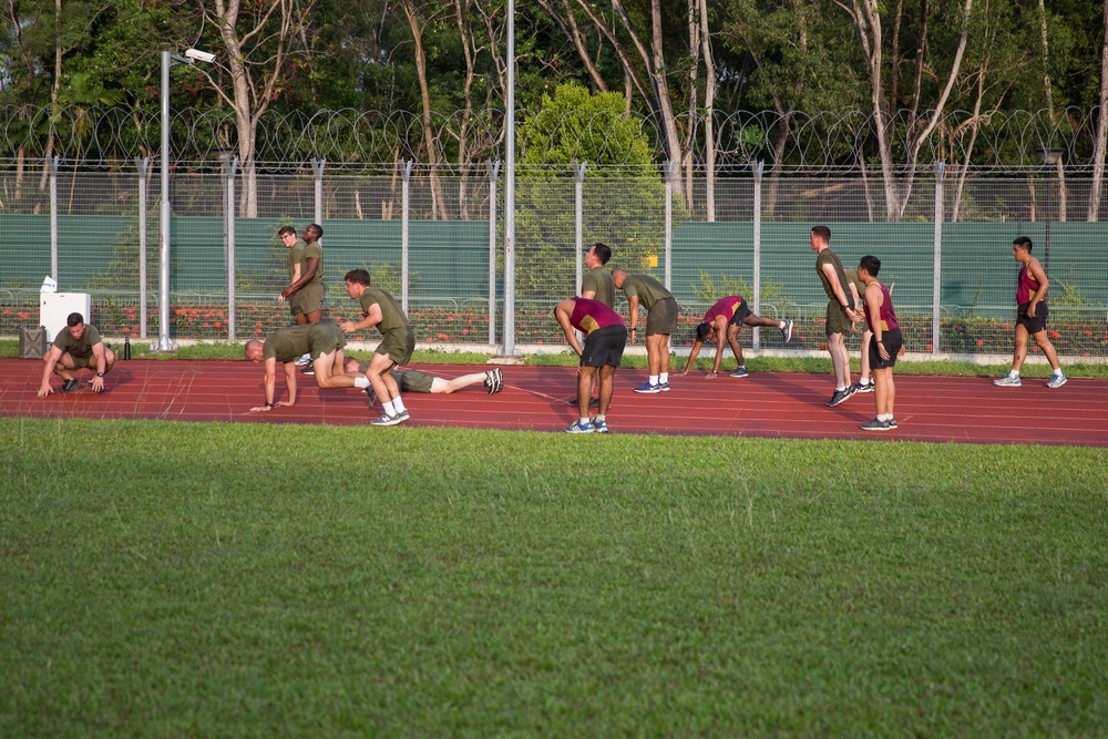 U.S. Marines and SAF Warm-Up for FINEX with PT