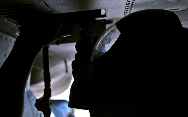 Airman checks F-16 EPU