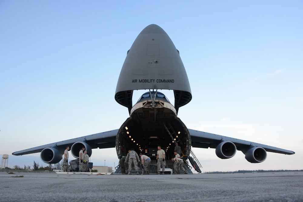Westover aerial porters unload C-5 filled with Hurricane Irma relief equipment